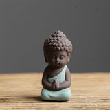 Statuette Bouddha en céramique (existe en plusieurs 4 coloris)